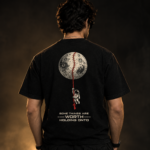 MURN black astronaut moon graphic T-shirt worn by model showing back design