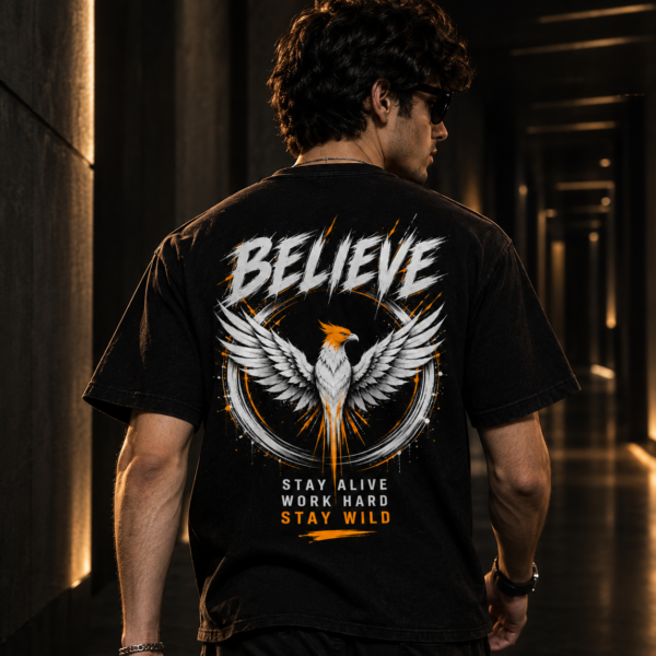MURN black Believe eagle graphic T-shirt worn by model showing back design